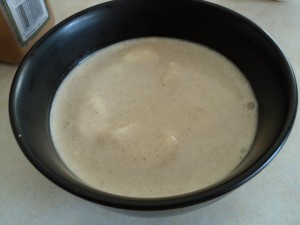 Heating the ingredients milk sugar and salt in a saucepan