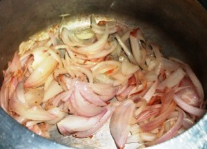 Preparing Ghee rice and deep fry chopped onions